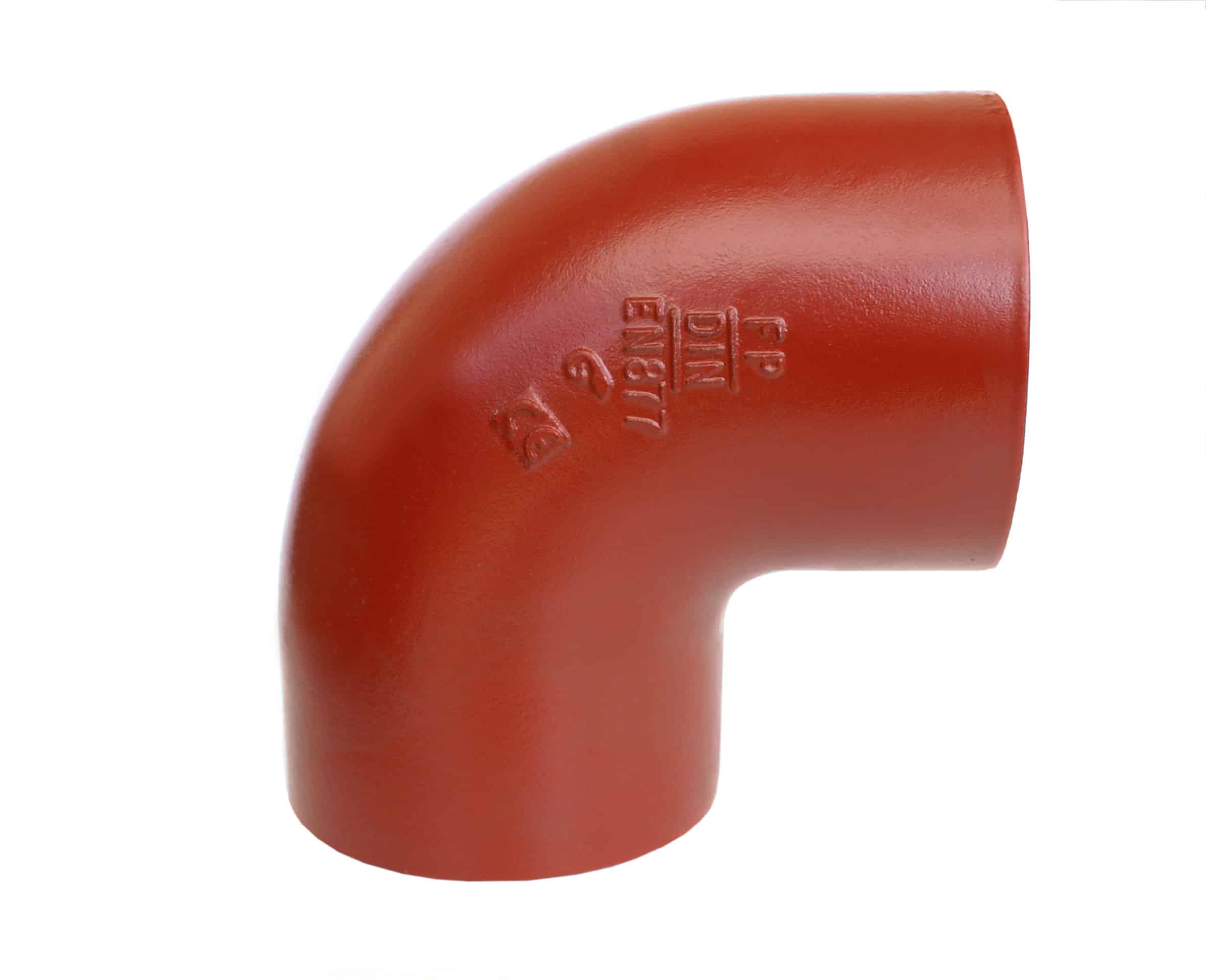 Close-up of a red curved plastic elbow pipe fitting with embossed text on its surface