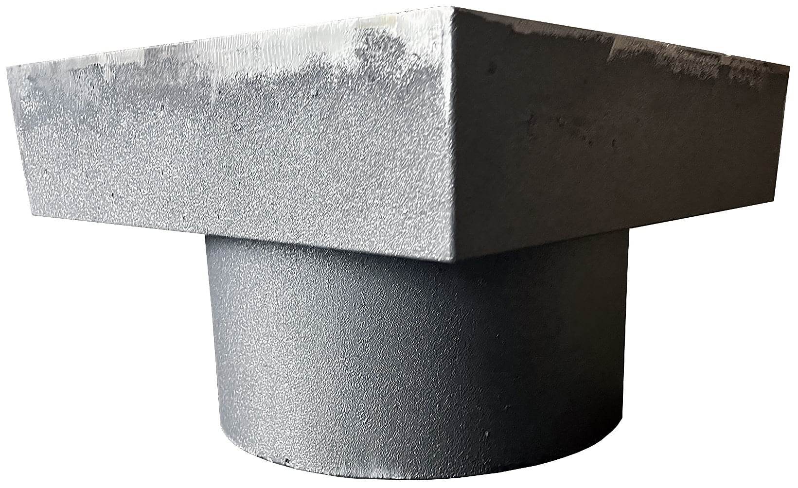 Close-up of a textured metal pedestal or support column with a rectangular cap over a rounded base, showing brushed steel texture.