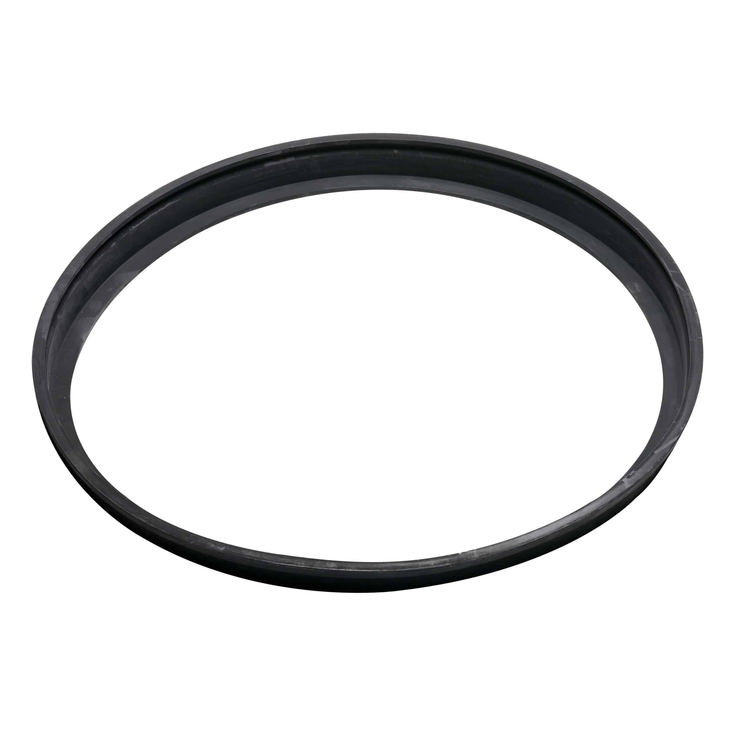 Close-up of a black rubber circular ring against a white background, showing the outer edge of the ring.