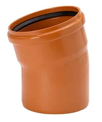 Orange PVC pipe coupling with a rubber gasket inside.