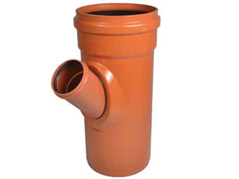 Orange PVC drain pipe with a side branch fitting (vertical main tube and angled side inlet)