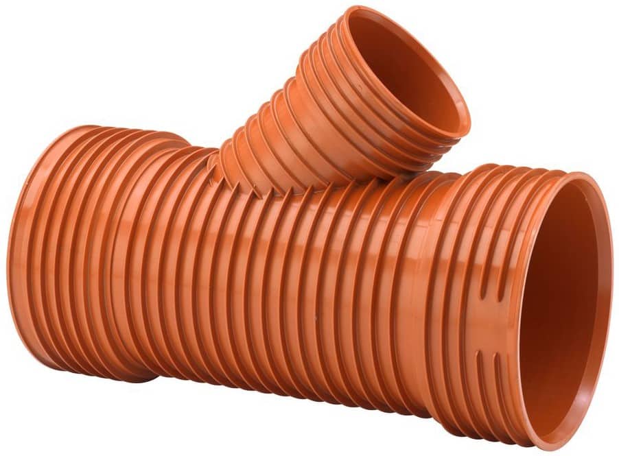 Orange flexible plastic drainage pipe with a 90-degree elbow fitting, used for plumbing or drainage systems.