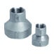 Two metal stepped cylindrical spacers with central holes, one large and one small.