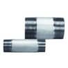 Two small cylindrical metal components with dark bands, lying on a white background.