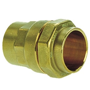 Brass compression pipe coupling fitting used to join two pipes in plumbing.