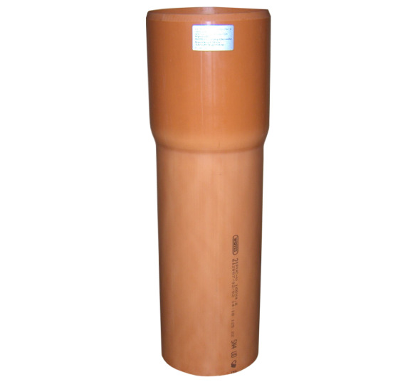 Vertical orange pipe fitting with a sealed top and label, standing upright (industrial/drainage component).