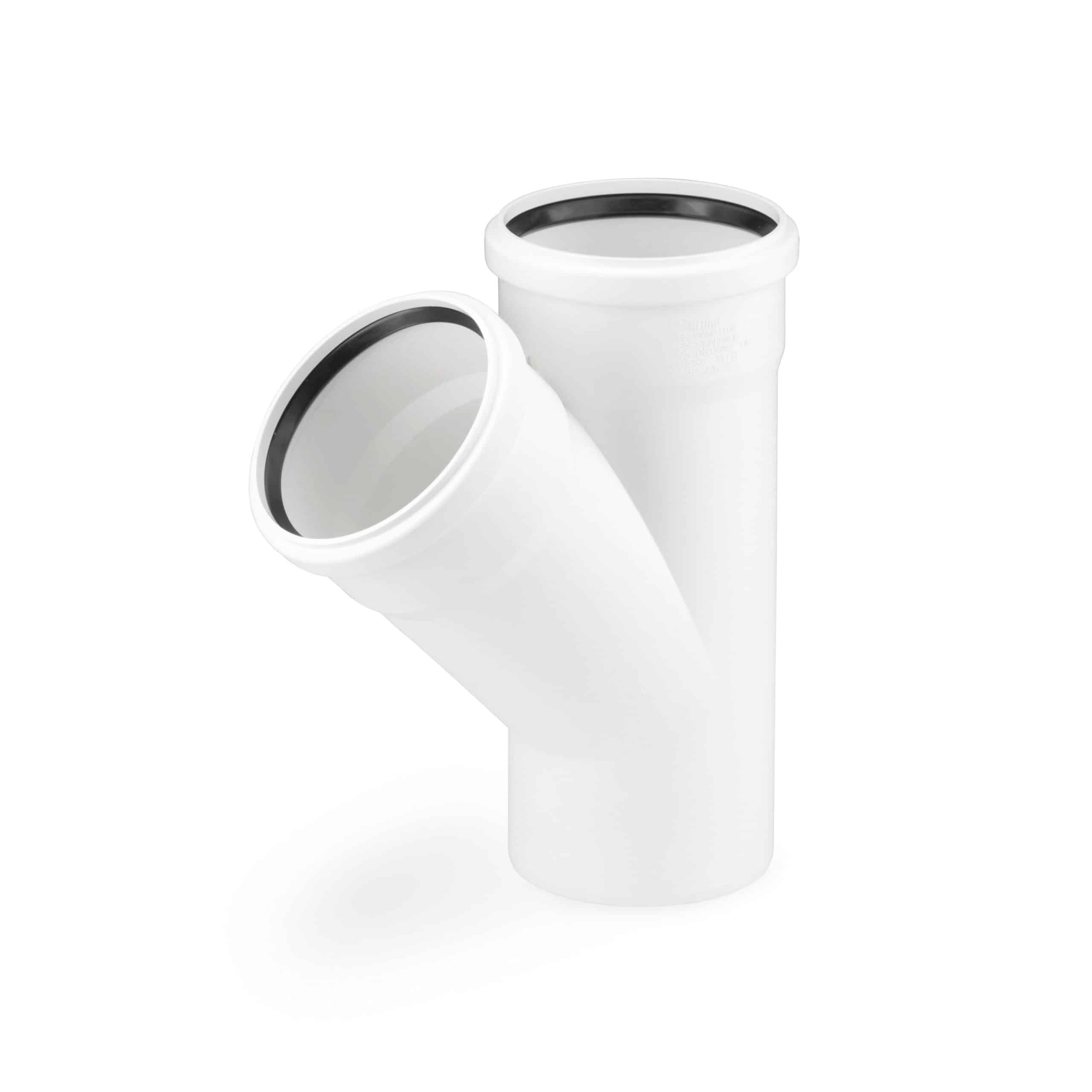 White PVC pipe elbow joints and cap against a white background, isolated image for plumbing fittings
