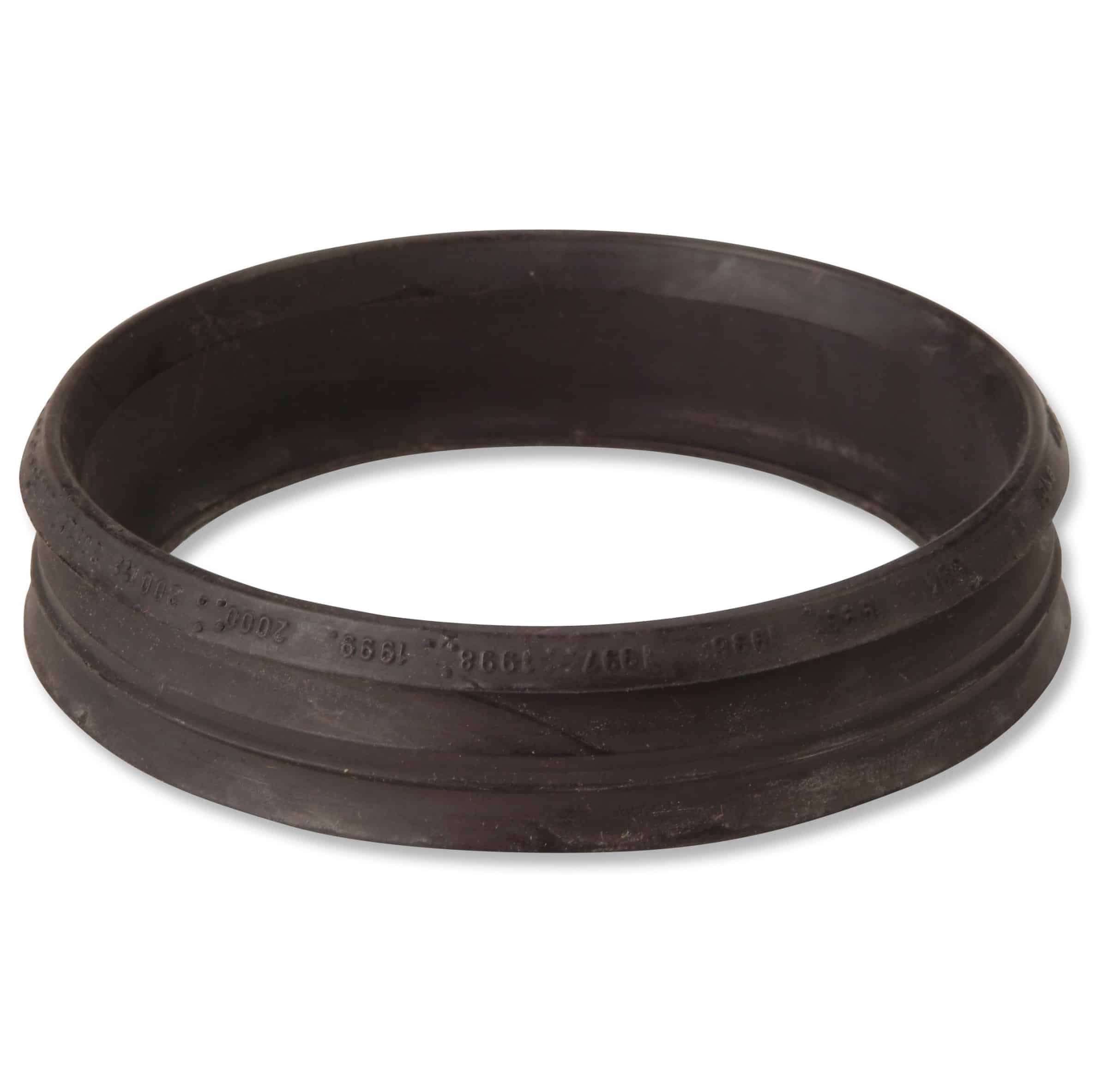 Close-up of a black rubber gasket forming a circular ring against a white background, showing its textured surface and inner curve.