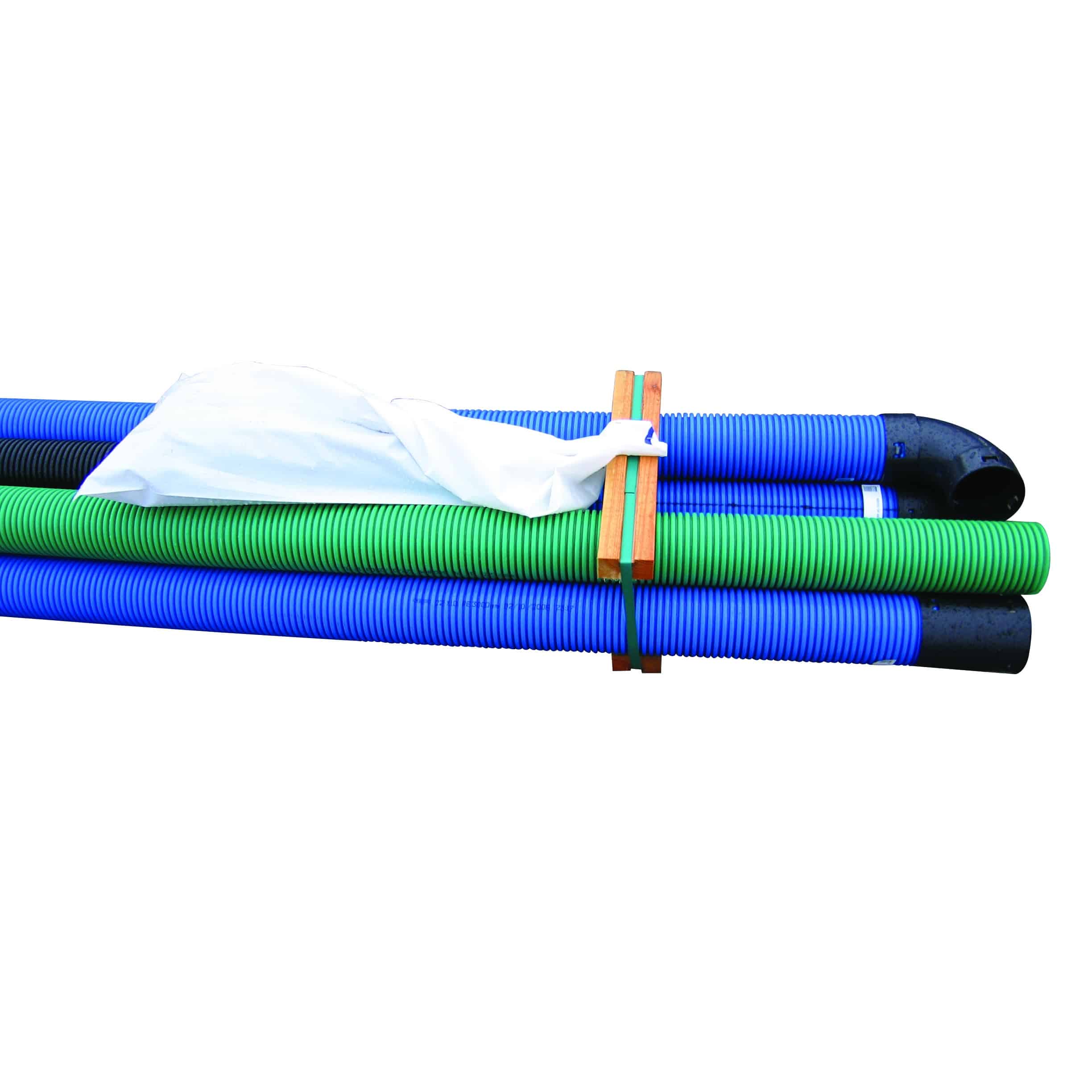 Stack of blue and green corrugated hoses with a white bag draped over them and wooden spacers/straps nearby.