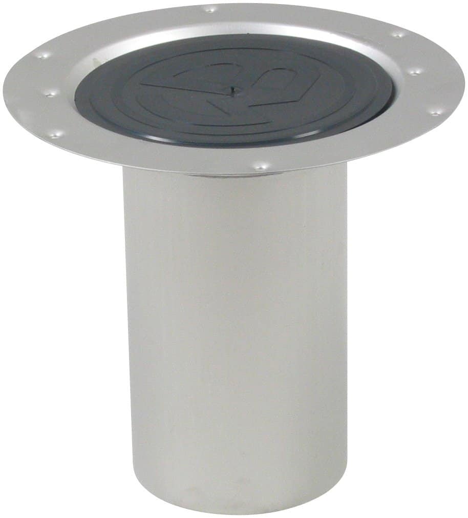 White cylindrical pedestal with a round metal maintenance access cover on top, like a floor cleanout access point in a wall or floor.