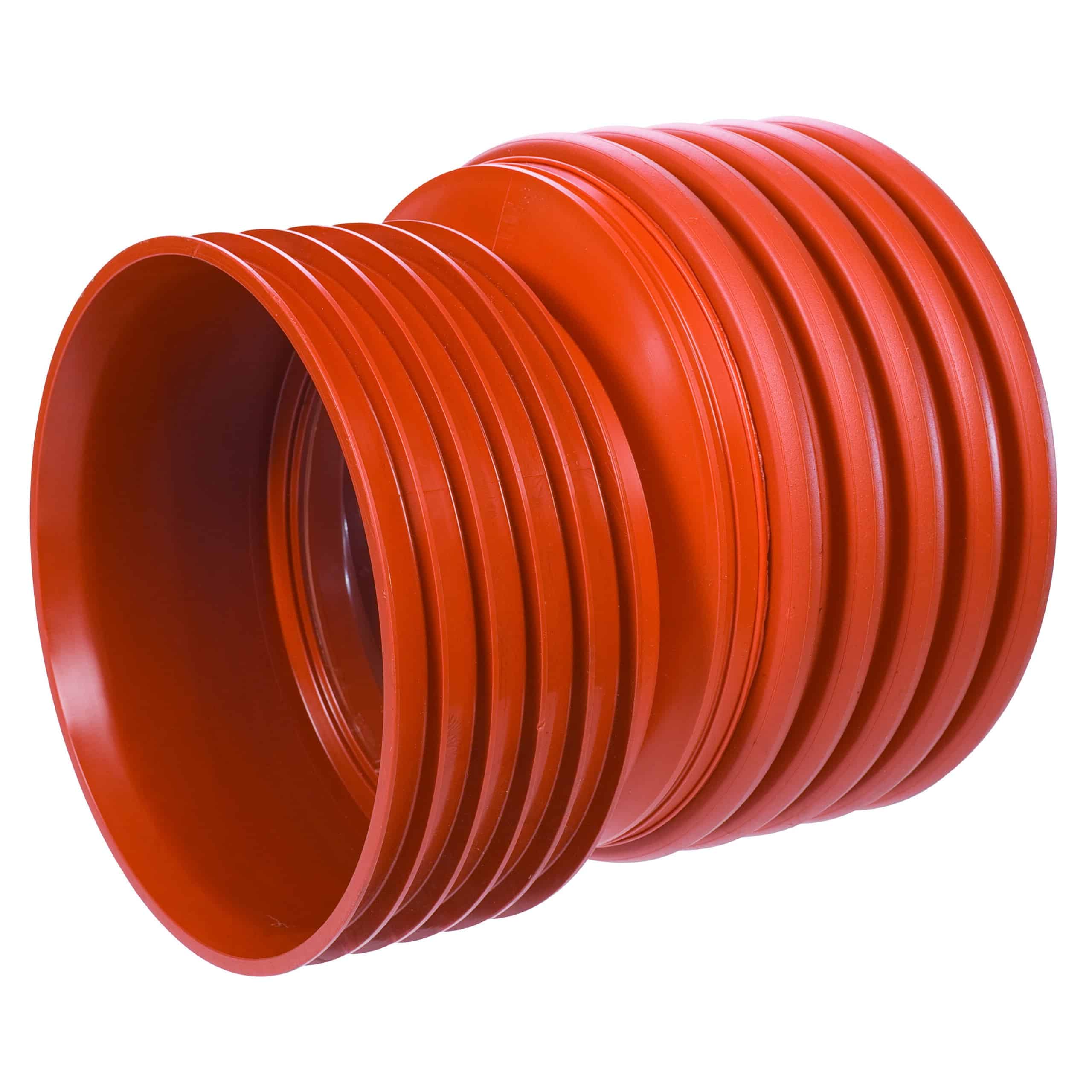 Red flexible plastic hose coiled into a spiral with ridged surface pieces visible in close-up.