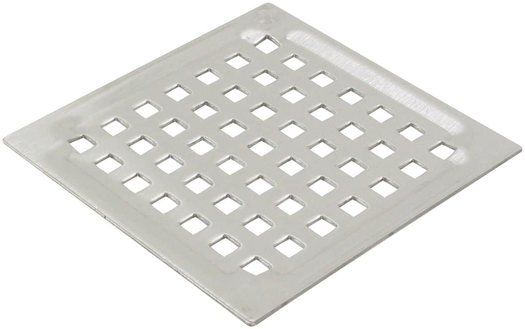 Square metal drain grate with a grid of square openings for drainage at floor level.