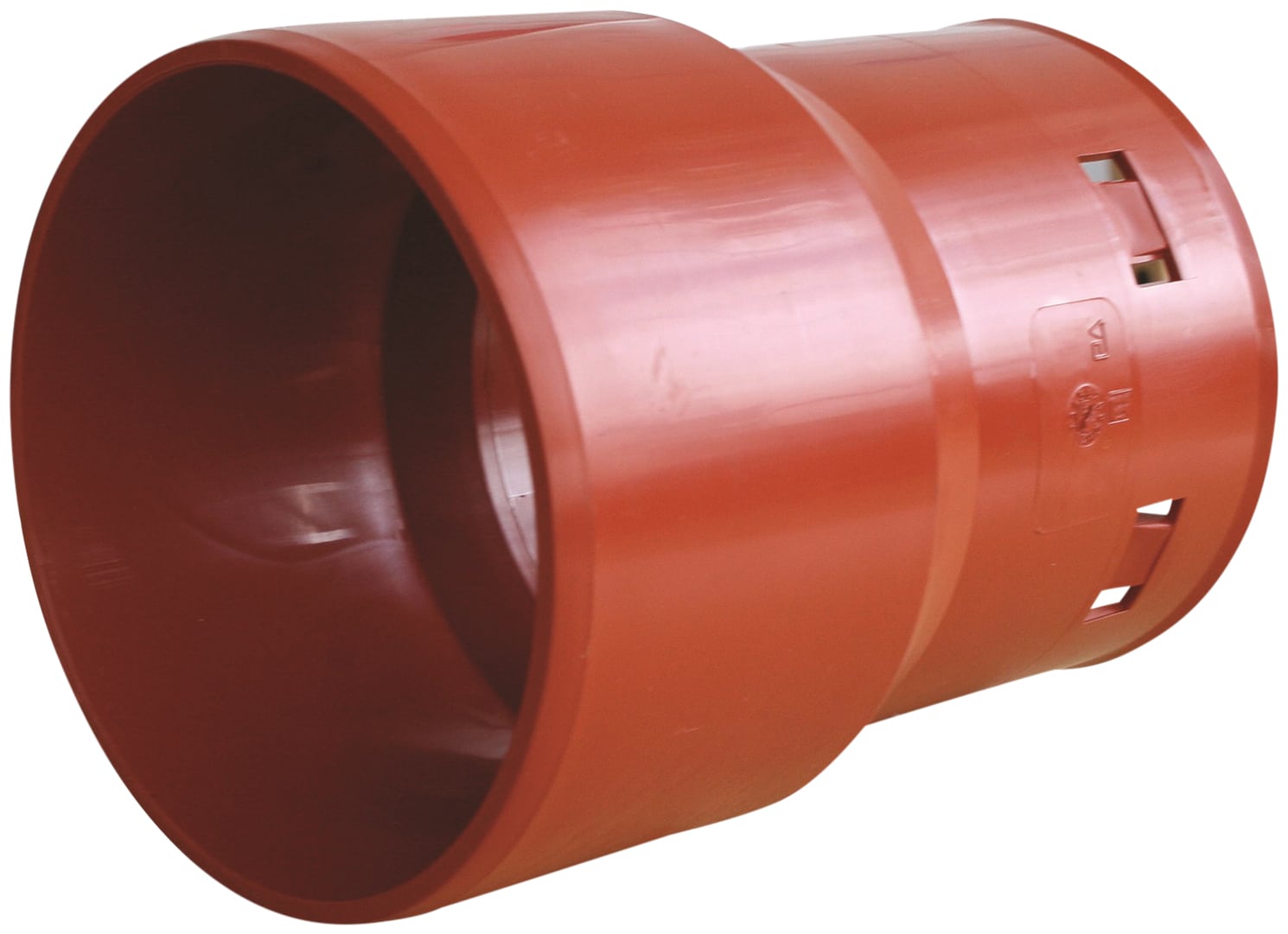 Red plastic pipe coupling in a cylindrical form, used to join two pipe sections.