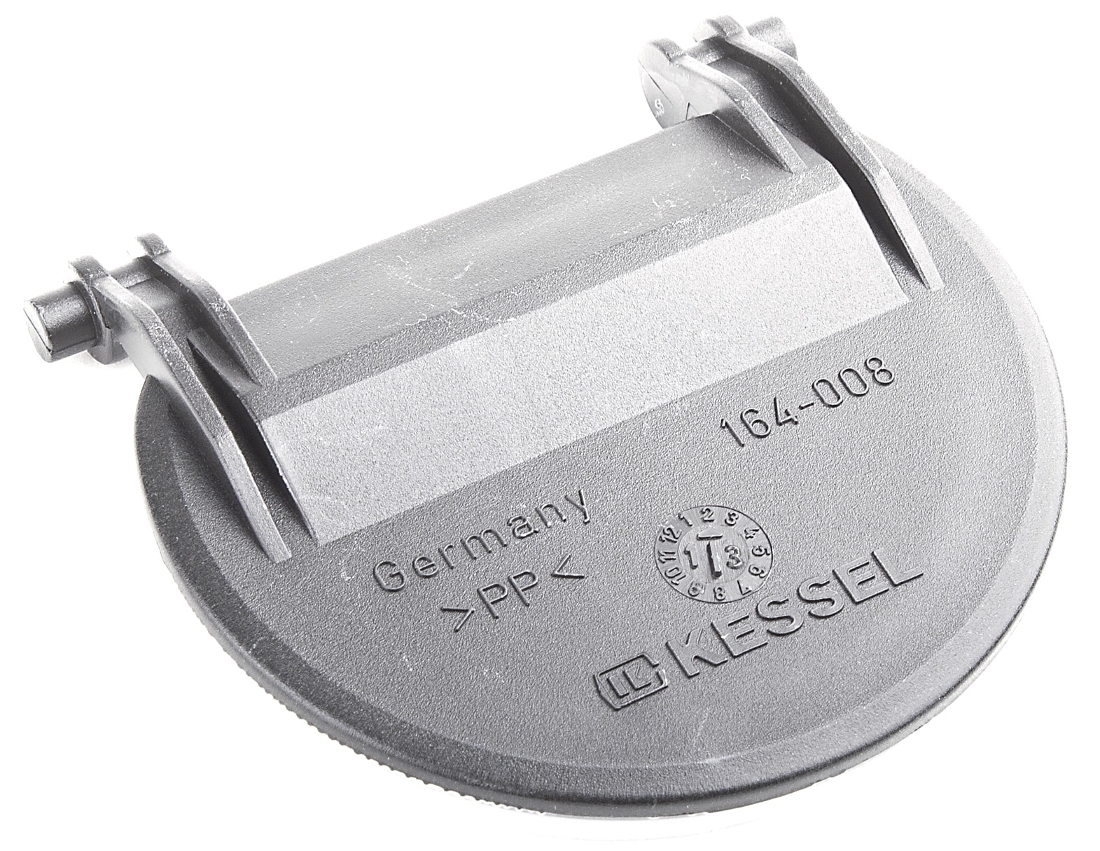 Close-up of a round gray plastic cap with two metal locking levers and a bolt, a mounting clamp component.