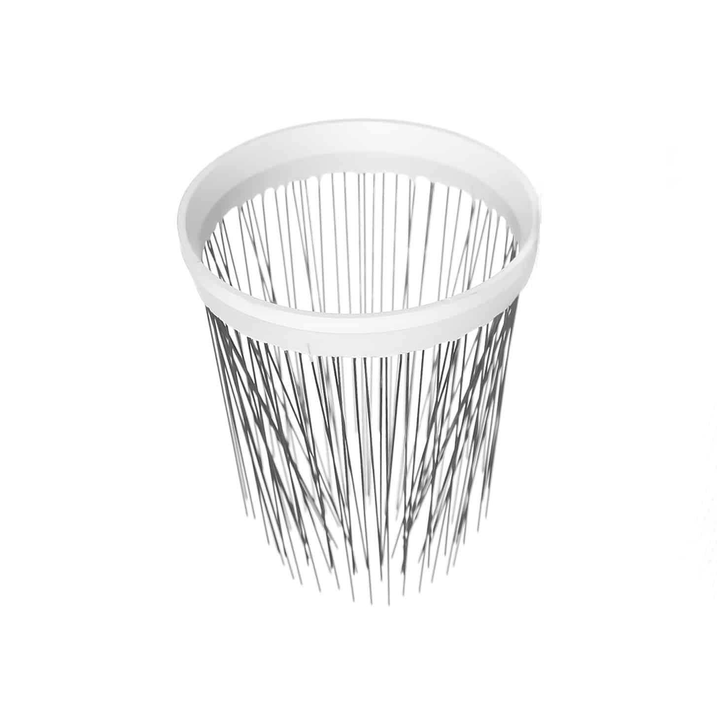 Top-down view of a white-rimmed wire mesh wastebasket with vertical metal spokes forming a cylindrical shape.