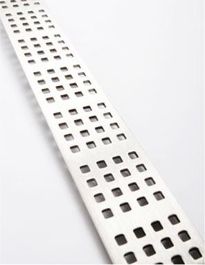 Metal drain grate with square holes, angled across a white surface.