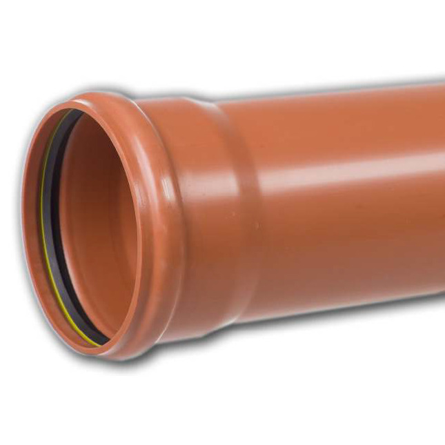 Close-up of an orange PVC plumbing pipe end with a black and yellow gasket inside.