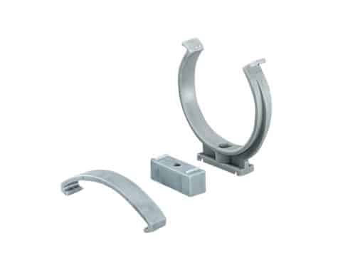Set of gray semicircular pipe clamps with a small rectangular connector, used to secure a round pipe or rail.