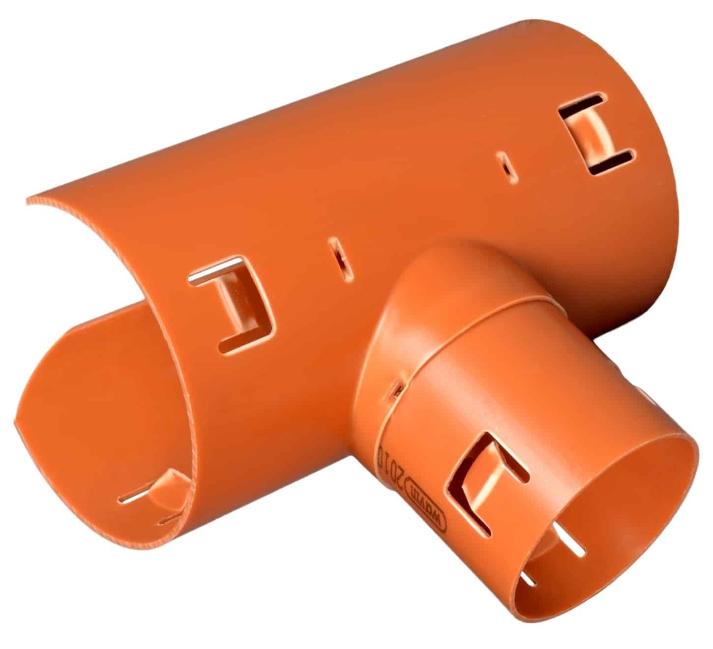 Orange plastic air vent/duct adapter with multiple rectangular slots and a cylindrical collar (close-up).