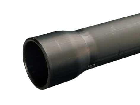 Dark-colored cylindrical pipe end, open circular mouth, viewed from the side.