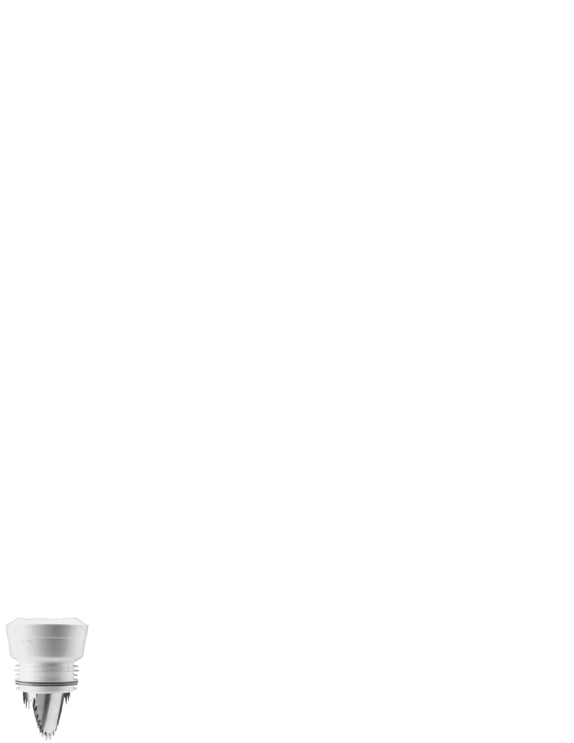 Close-up of a white plastic spray nozzle with a metal threaded tip and spiral ridges, oriented vertically along the left edge.
