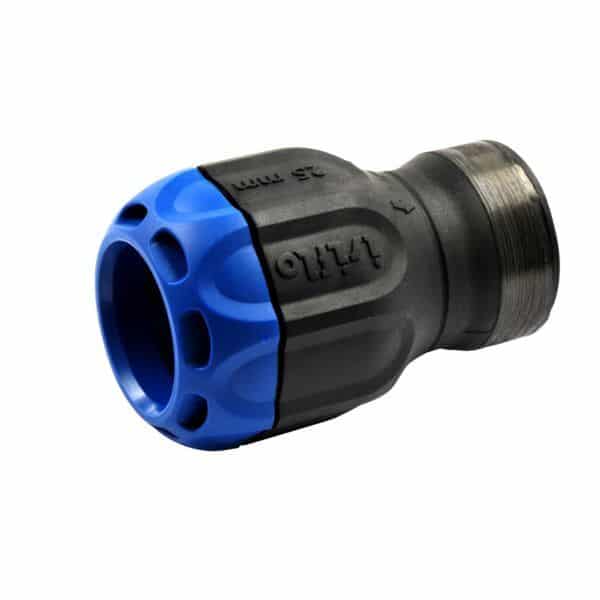 Blue and black plastic hose connector with a threaded metal end readied for attachment in a garden setup