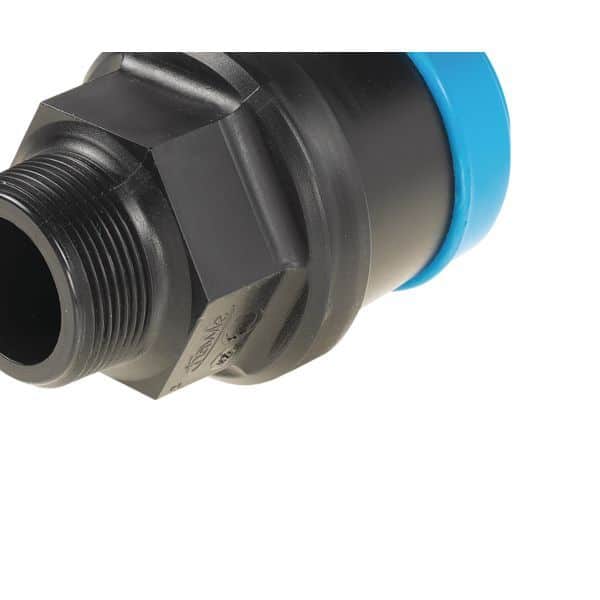 Close-up of a black threaded pipe fitting with a blue cap, viewed from an angle.