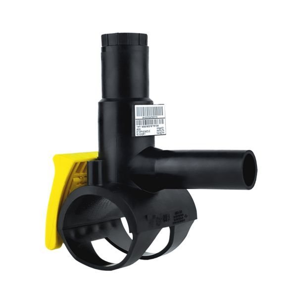Black plastic irrigation valve with a side outlet and yellow mounting plate/badge for installation.