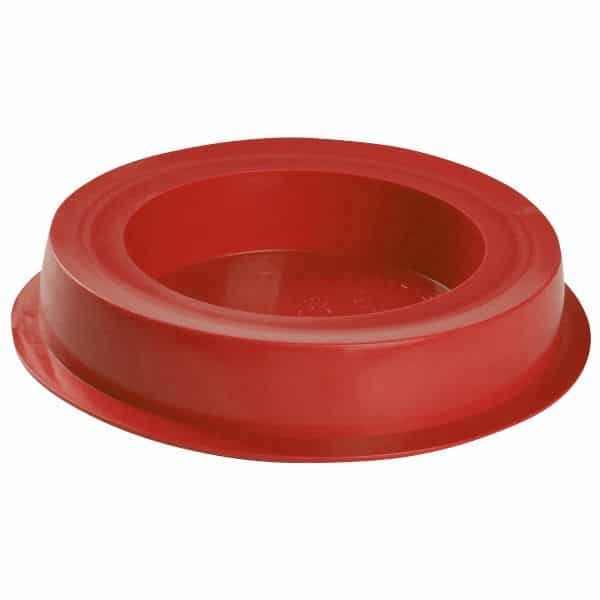 Red donut-shaped silicone dish with a wide flat base and hollow center.